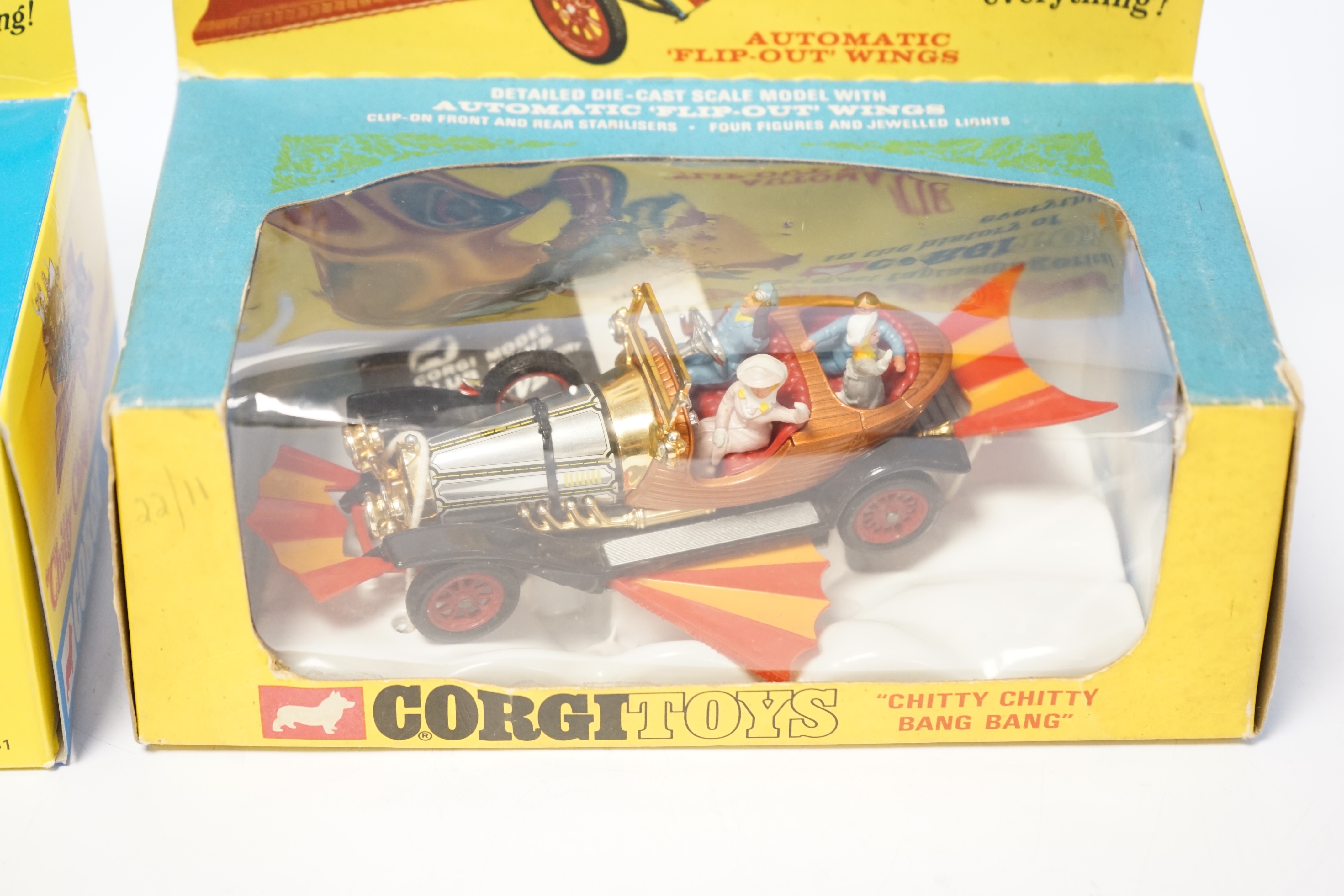 A Corgi Toys Chitty Chitty Bang Bang (266), boxed with inner plastic cloud display stand and reproduction card background, together with an additional reproduction box and cloud display stand. Condition - fair to good -